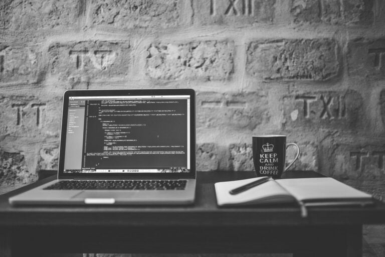 coding coffee cup black and white photo